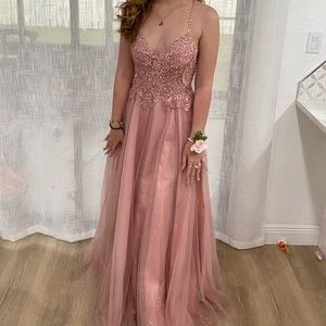 Long, glitter pink prom dress with floral lace at the top